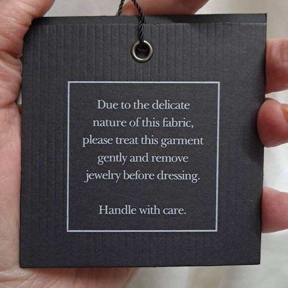 Elegant White V-Neck Gown - Picture 9 of 12